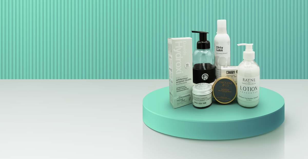 Our Cancer Support Kit containing Sensitive Toothpaste, Deodorant Cream, Refillable Hand Wash, Sensitive Laundry Care,  Emogene Healer Balm, and Rayne  natural Lotion Unscented.