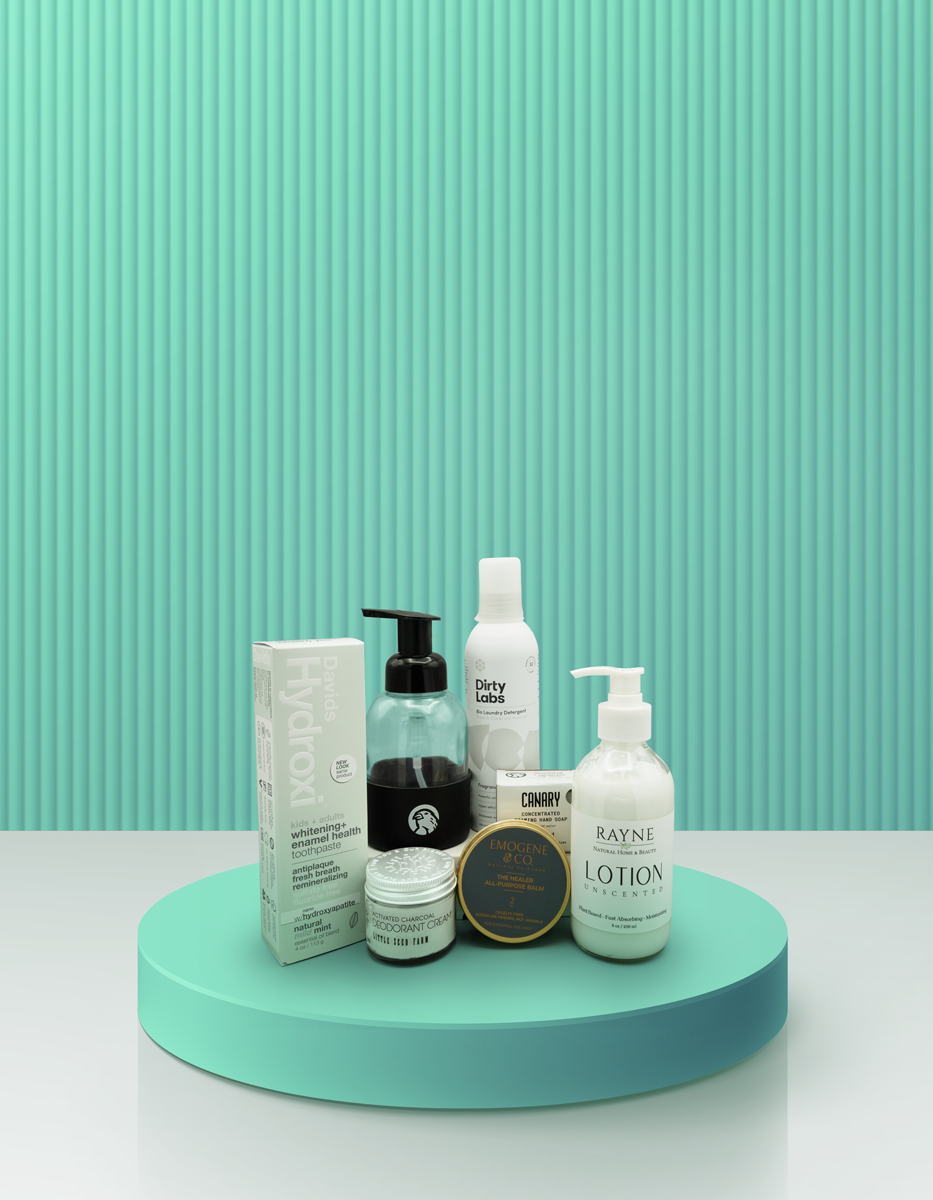 Our Cancer Support Kit containing Sensitive Toothpaste, Deodorant Cream, Refillable Hand Wash, Sensitive Laundry Care,  Emogene Healer Balm, and Rayne  natural Lotion Unscented.